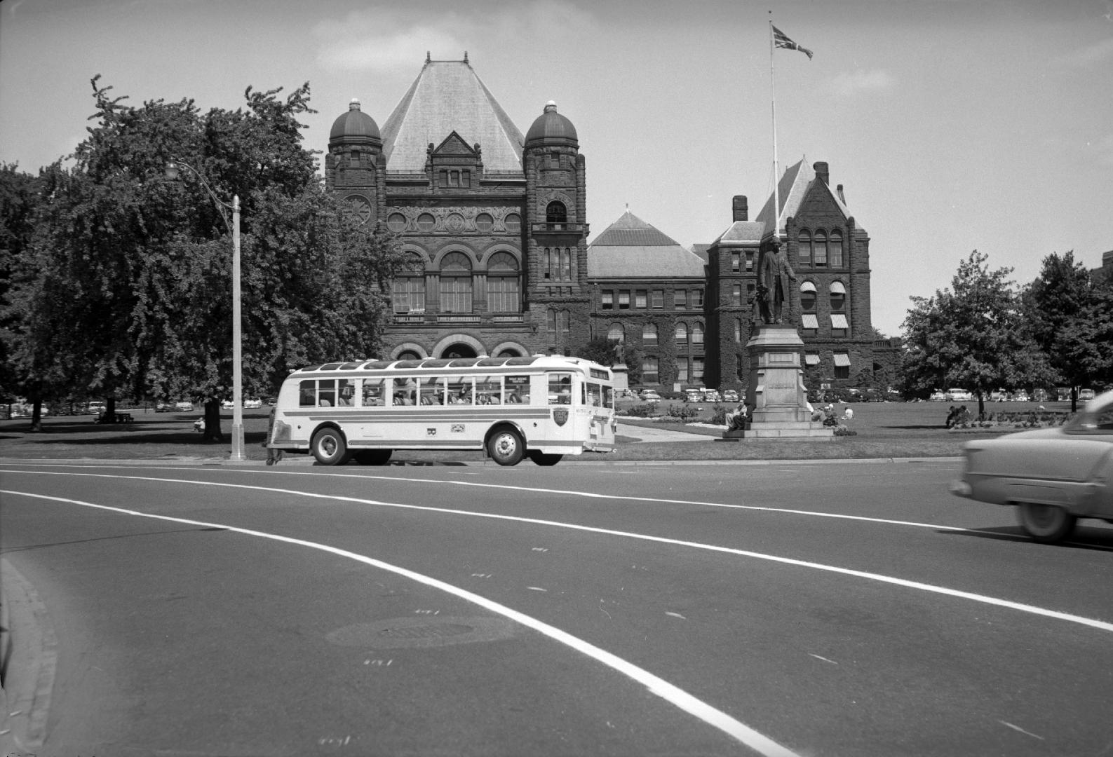 Gray Coach Lines, bus #651, on Queen's Park Crescent, in front of Parliament Buildings