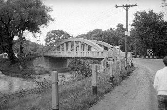 Don Mills Road., bridge over East River at forks of Don, looking northeast, West Don River at left