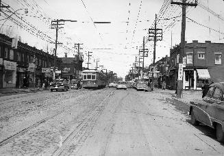 Yonge St. looking north from south of Ranleigh Ave. Image shows Yonge street with a streetcar a ...