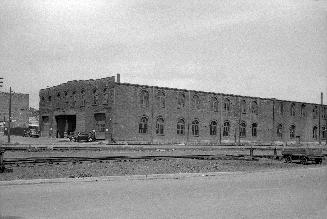 T.T.C., garage, Sherbourne Garage, Sherbourne St., n.west corner Esplanade E., looking northeast from Esplanade E., west of Frederick St
