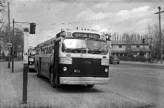 T.T.C., bus #1728, on Kingston Road, looking north east across Midland Avenue