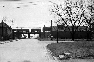 Historic photo from Saturday, April 9, 1955 - Ellis Ave., looking s. from n. of Queen St. (now site of The Queensway) to the railway bridge in Swansea