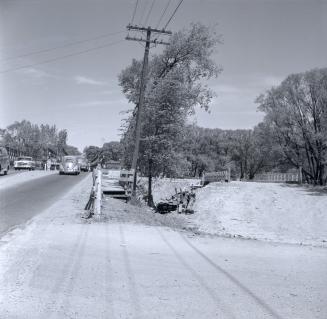 Yonge Street looking north across temporary bailey bridge over West Don River, south of York Mills Rd, showing temporary bridge to east of Yonge Street at right