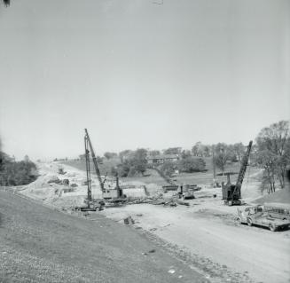 Macdonald-Cartier Freeway, looking west to bridge over Humber River, west of Weston Road, during reconstruction