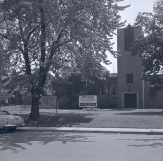Zion Baptist Church, Castlefield Ave., south side, east of Duplex Ave. Image also shows a sign  ...