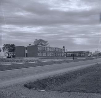 Rexdale Public School, Barrhead Crescent, east side, opposite Redcliff Boulevard, looking southeast along Barrhead Crescent