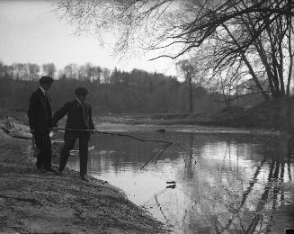Image shows a few gentlemen fishing in Don River.