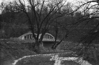 Don Mills Road., bridge over East Don River at forks of Don, looking south, West Don River in foreground