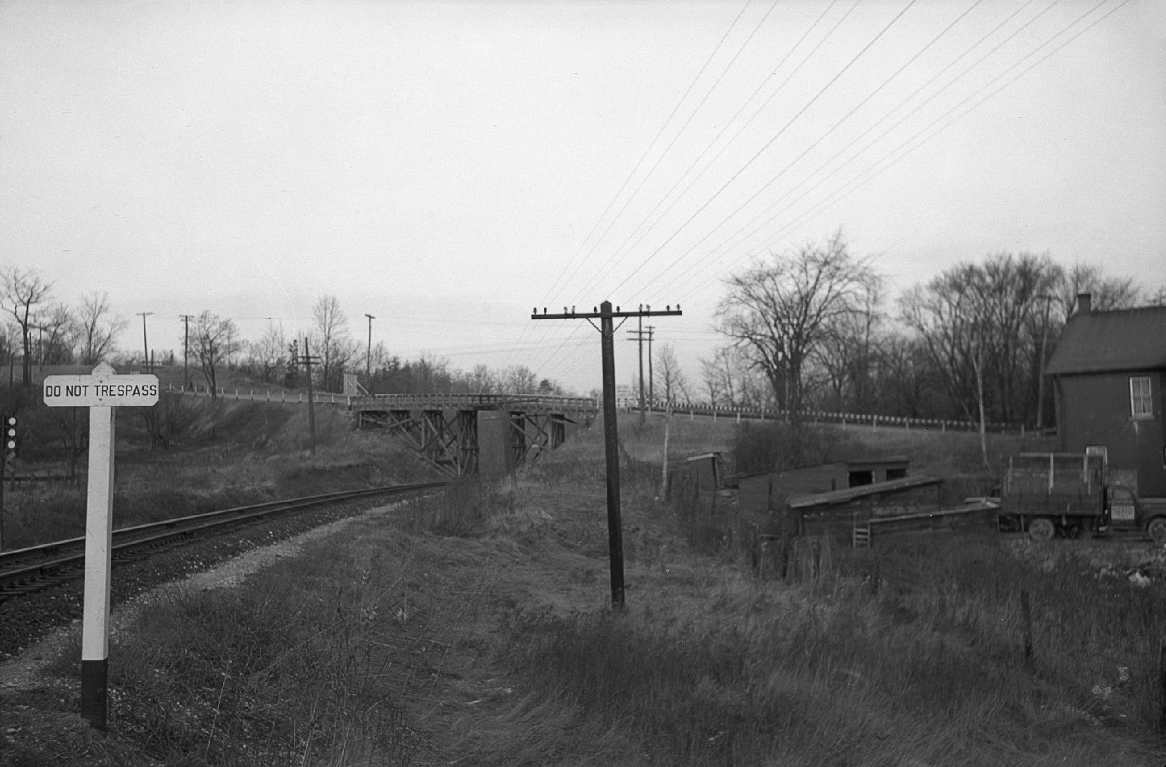 Don Mills Road., bridge over C.N.R. tracks north of forks of Don River, looking east
