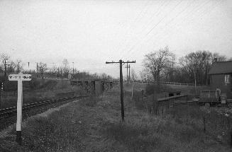 Don Mills Road., bridge over C.N.R. tracks north of forks of Don River, looking east