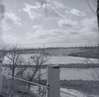 Humber River, looking southwest from Riverside Drive, just north of South Kingsway, to former Humber Bay Golf Course across river