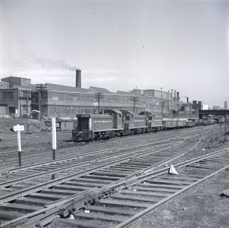C.N.R. line, south of King St. West, west of Strachan Avenue, John Inglis Co. factory in background