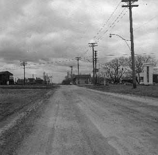 St. Clair Avenue E., looking west from east of C.N.R. crossing east of Laurel Avenue, Toronto, Ontario