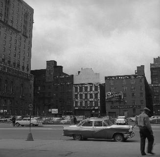Front Street West, looking north between Bay & York Streets to Piper St
