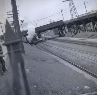 LAKESHORE RD., bridge over C.N.R. tracks, south of King Street West, looking e