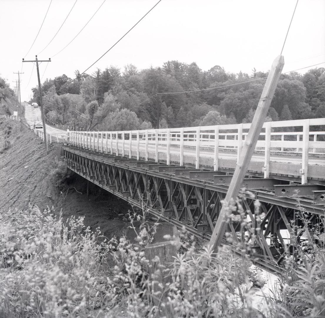 Bathurst St., south across West Don River, showing Bailey bridge replacing bridge destroyed in Hurricane Hazel