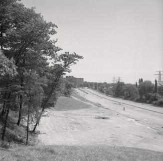 (The) Queensway, looking e. from Howard Road., during construction