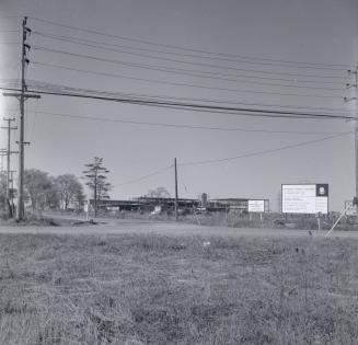 Finch Avenue W., looking northwest from e. of Bathurst St., showing Northview Heights Secondary School under construction