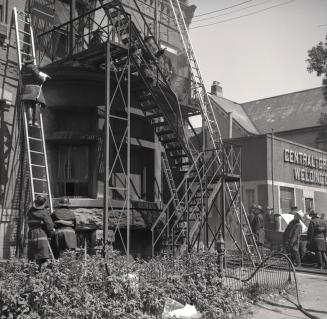 Gerrard Street East, north side, between Church & Mutual Streets, aftermath of fire caused by explosion of motor-car's gas tank while car was being welded