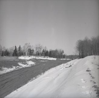 Image shows a street view in winter.