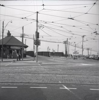 Lakeshore Road., looking southwest from King-Roncesvalles intersection to bridge over C.N.R. tracks, showing Sunnyside Railway Station (C.N.R.) at left