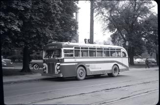 Hollinger Bus Lines, bus #62, in front of Toronto Western Hospital, Bathurst St