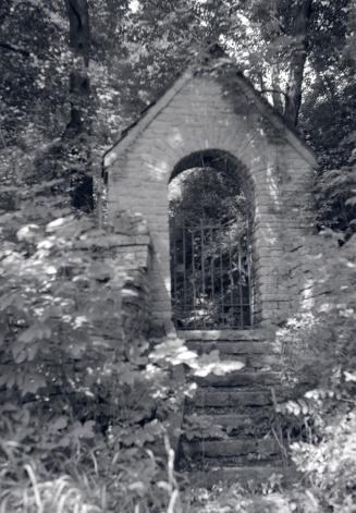 Historic photo from 1954 - Stone gate in the trees - Edgar A. Eaton, house, Blythwood Rd., s.w. corner Bayview Ave. in Lawrence Park