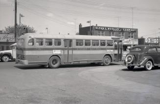 Danforth Bus Lines, bus #64, in front of garage, Danforth Avenue, south side, between Elward Boulevard & August Avenue, looking north across Danforth Avenue