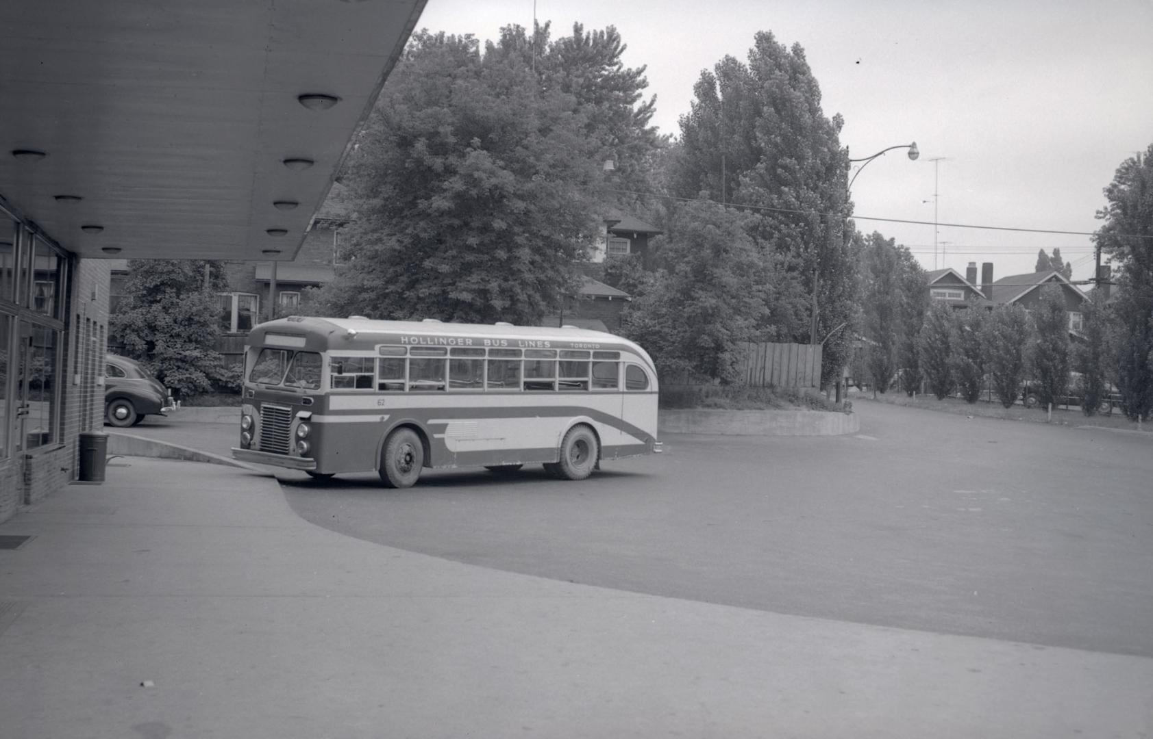 Hollinger Bus Lines, bus #62, at terminal, Danforth Avenue, north side, between Coxwell & Woodington Aves