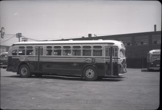T.T.C., bus #951, at Sherbourne Garage, Sherbourne St., northwest corner Esplanade E., looking northeast