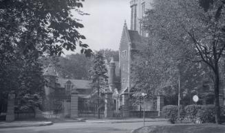 Image shows a very limited view of Casa Loma and stables on the left.