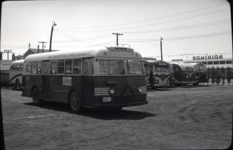 Hollinger Bus Lines, bus #47, at garage, Woodbine Avenue, southeast corner O'Connor Dr., looking southwest