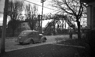 Dundas Street West, looking southeast from Abbott Avenue, showing bridge leading to Wallace Avenue over railway tracks