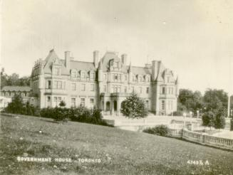 Image shows a three storey Government House.
