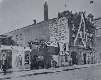 South African War, parade of returned Canadian troops, decorations on Hastings & Peterkin's planing mill, Bay St