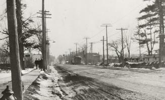Yonge Street looking south from Bedford Park Avenue. Image shows a street view with some people ...