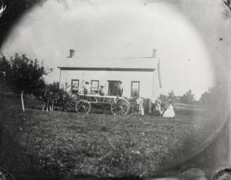 Lynn, house, Glebe Road East, Toronto, Ontario. Image shows a horse carriage and a few people s ...