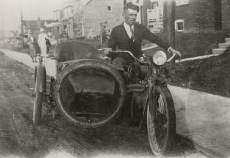 Snowdon Avenue, between Mount Pleasant Road and Ronan Avenue. Image shows a gentleman sitting o ...