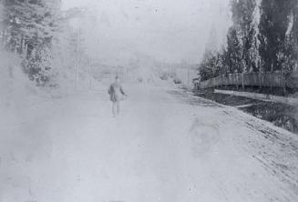 Yonge Street looking north from Glengrove Avenue. Image shows a pale picture of the street and …