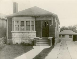 House, 205 Glengarry Ave., south side, west of Elm Road. Image shows a bungalow with a few stai ...