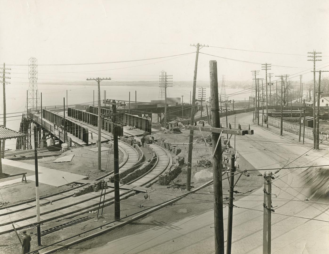 Lakeshore Road., looking southwest from King-Roncesvalles intersection to bridge over C.N.R. tracks, showing The Queensway at right