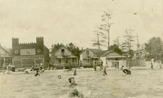 Beaches Park, showing Kew Beach (street) west from Leuty Avenue (at right), Kew Beach Club House at left