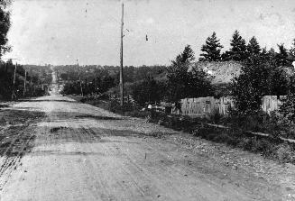 View north of Yonge Street from Hogg's Hollow, Toronto, Ontario. Image shows a street view. The ...
