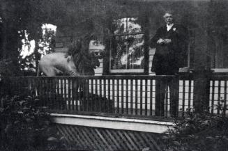 Reverend Thomas West Pickett on veranda of Golden Lion Hotel