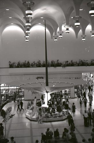 Historic photo from 1968 - Yorkdale Shopping Centre - pale grey terazzo marble court under 110 slalactite ceiling outside Simpsons in Yorkdale