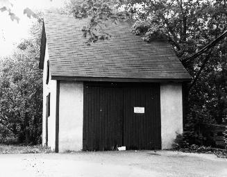Shed at back of 60 Roselawn Avenue, Toronto, Ontario. Image shows the side with the doors. Ther ...