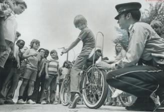 The safe way to ride a bicycle is taught in schools by the Metro Police traffic safety bureau, which also inspects bikes. At Walter Perry Public Schoo(...)