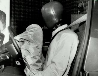 The safety air bag (left) inflates in a fraction of a second to protect a passenger in severe head-on collisions