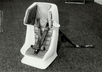Tether required: In addition to using a seat belt to hold down child s safety car seat, strap at rear of the child s seat now must be attached to the car frame to meet safety standards