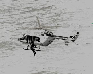 Dramatic Moment: One of the chopper s missions was this rescue near the Toronto waterfront of two men whose plane had crashed into the lake